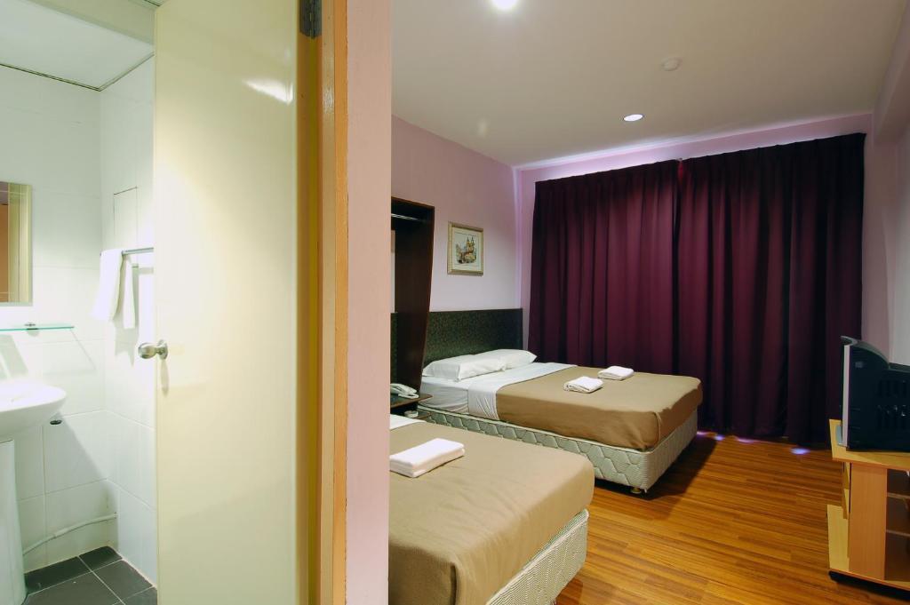 Aristo Hotel Putatan Kota Kinabalu Zimmer foto